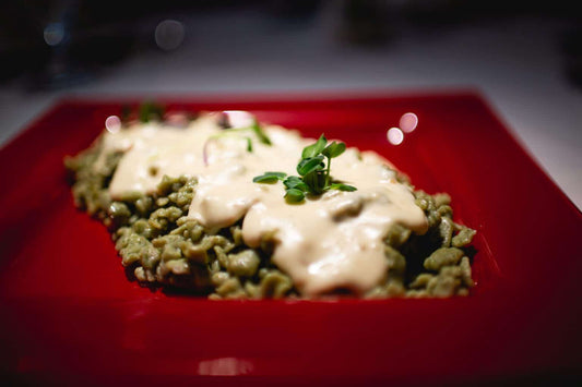 Spinatnockerl mit Käsesoße
